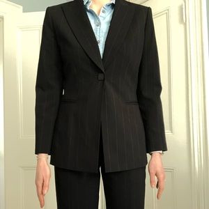 Black and gold women’s pinstripe suit